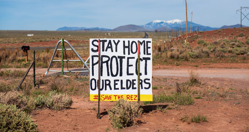 photo of stay home and protect our elders sign