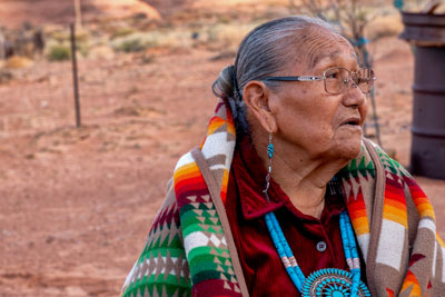 photo of Native American Elderly woman looking off into the distance