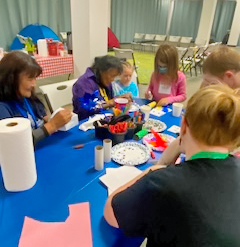 Fairbanks Native Association elders teaching art to kids.